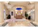 Luxurious main bedroom featuring raised platform, custom lighting, and elegant decor at 942 Villa Grande Way, Boulder City, NV 89005