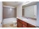 Bathroom with granite vanity and shower/tub combo at 5060 Indian River Dr # 377, Las Vegas, NV 89103