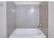 Bathroom with shower/tub and granite walls at 5060 Indian River Dr # 377, Las Vegas, NV 89103