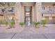 Building exterior showcasing a walkway, staircase, and landscaping at 5060 Indian River Dr # 377, Las Vegas, NV 89103