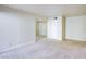 Bright living room with neutral walls and carpeting at 5060 Indian River Dr # 377, Las Vegas, NV 89103