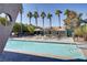 Refreshing community pool with ample lounge chairs and shade structures at 5060 Indian River Dr # 377, Las Vegas, NV 89103