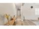 Bright and spacious hallway with wood-look flooring at 10086 Mountain Foothills Ave, Las Vegas, NV 89149