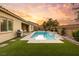 Spacious backyard oasis with a refreshing pool and spa at 10086 Mountain Foothills Ave, Las Vegas, NV 89149