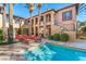 Gorgeous backyard with a swimming pool, lounge chairs, and well-maintained landscaping, perfect for outdoor relaxation at 10117 Summit Canyon Dr, Las Vegas, NV 89144