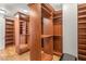 Large walk-in closet with custom shelving and storage solutions at 10117 Summit Canyon Dr, Las Vegas, NV 89144