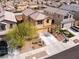 Scenic aerial shot of a two-story house with a two-car garage and nicely landscaped front yard at 1012 Water Cove St, Henderson, NV 89011