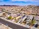 Great neighborhood aerial view with desert landscape showcasing two-story homes and a street at 1012 Water Cove St, Henderson, NV 89011