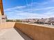 Private balcony showcasing desert views under a bright blue sky, creating an inviting outdoor living space at 1012 Water Cove St, Henderson, NV 89011
