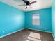 Bright bedroom with a modern ceiling fan and natural light, showcasing a cozy and inviting space at 1012 Water Cove St, Henderson, NV 89011