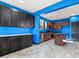 Kitchen featuring tile flooring, granite countertops, lots of cabinet space, and stainless steel appliances at 1012 Water Cove St, Henderson, NV 89011