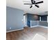 Bright living room featuring a staircase leading upstairs, neutral carpet and walls, and an airy atmosphere at 1012 Water Cove St, Henderson, NV 89011