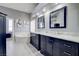 Elegant bathroom boasts double vanity, soaking tub, and marble at 10201 Los Padres Pl, Las Vegas, NV 89134