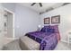 Spacious bedroom with plush bedding and ample closet space at 10201 Los Padres Pl, Las Vegas, NV 89134