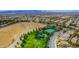 Aerial view of a community park with tennis courts and playground at 10718 Del Rudini St, Las Vegas, NV 89141