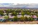 Aerial view of houses and community amenities in a residential neighborhood at 10718 Del Rudini St, Las Vegas, NV 89141