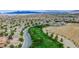 Aerial view of neighborhood with community park and walking paths at 10718 Del Rudini St, Las Vegas, NV 89141