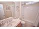 Clean bathroom with tub, shower, and updated vanity at 10718 Del Rudini St, Las Vegas, NV 89141