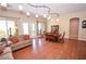 Bright dining room with hardwood floors and access to a patio at 10718 Del Rudini St, Las Vegas, NV 89141