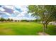 Photo of a lush green park with playground equipment at 10718 Del Rudini St, Las Vegas, NV 89141