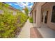 Landscaped walkway along the side of the house at 10718 Del Rudini St, Las Vegas, NV 89141