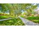 Photo of a park with a walking path and lush landscaping at 10718 Del Rudini St, Las Vegas, NV 89141