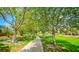 Photo of a park with a walking path and lush landscaping at 10718 Del Rudini St, Las Vegas, NV 89141