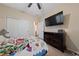 Bedroom with ceiling fan, neutral walls, and carpeted floor at 11290 Hazel Rock St, Las Vegas, NV 89179