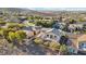 Aerial view showcasing a house's backyard, landscape, and neighborhood location at 12 Oro Valley Dr, Henderson, NV 89052