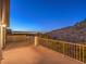 This spacious balcony offers stunning views of the city lights and hillside at 12 Oro Valley Dr, Henderson, NV 89052