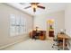 Home office/bedroom with natural light, plantation shutters and desk at 12 Oro Valley Dr, Henderson, NV 89052