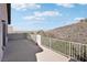 Spacious deck with mountain views and a metal railing at 12 Oro Valley Dr, Henderson, NV 89052