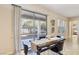 Casual dining area with sliding doors leading to the backyard at 12 Oro Valley Dr, Henderson, NV 89052