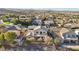 Overhead view showcasing the home's rear balcony in a community with mature landscaping at 12 Oro Valley Dr, Henderson, NV 89052