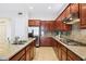 Kitchen with stainless steel appliances and granite countertops at 12 Oro Valley Dr, Henderson, NV 89052