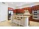 Modern kitchen featuring stainless steel appliances and ample wood cabinetry at 12 Oro Valley Dr, Henderson, NV 89052