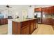 Kitchen with island, stainless steel appliances, and granite countertops at 12 Oro Valley Dr, Henderson, NV 89052