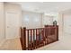 Bright upper landing with hardwood railing and access to rooms at 12 Oro Valley Dr, Henderson, NV 89052