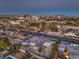 An aerial view looking over the property and neighborhood towards the city and mountains at 1202 S Rancho Dr, Las Vegas, NV 89102