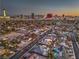 An aerial shot with a view of the neighborhood and the Las Vegas strip in the distance at 1202 S Rancho Dr, Las Vegas, NV 89102