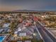 Aerial view of single-story home with pool, situated on a large lot near a busy street at 1202 S Rancho Dr, Las Vegas, NV 89102