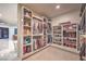 Large walk-in closet with shelving and hanging space for clothes and shoes at 1202 S Rancho Dr, Las Vegas, NV 89102