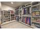 Custom-built walk-in closet with ample shelving and hanging space at 1202 S Rancho Dr, Las Vegas, NV 89102