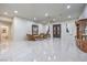 Expansive living area featuring tile flooring, ample lighting, and elegant decor at 1202 S Rancho Dr, Las Vegas, NV 89102