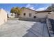 Backyard patio with retaining wall and gravel landscaping at 1592 Bamboo Bay Dr, Henderson, NV 89012