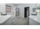 Modern bathroom with double vanity and soaking tub at 1592 Bamboo Bay Dr, Henderson, NV 89012