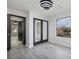 Bright bedroom with mirrored closet doors and window at 1592 Bamboo Bay Dr, Henderson, NV 89012