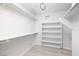 Spacious walk-in closet with ample shelving and hanging space at 1592 Bamboo Bay Dr, Henderson, NV 89012