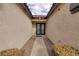 Front entry with double doors and pathway at 1592 Bamboo Bay Dr, Henderson, NV 89012