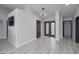 Bright foyer with gray walls and wood-look flooring at 1592 Bamboo Bay Dr, Henderson, NV 89012